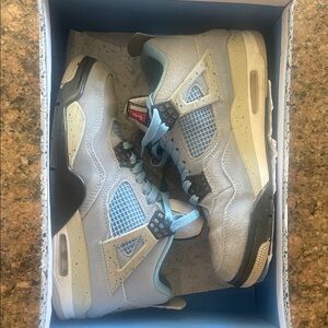 University Blue/Black Air Jordan 4 Retro